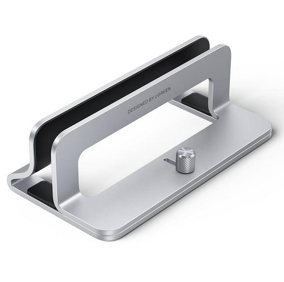 Soporte Vertical para Laptop / Adecuado para escritorio / Anchura Ajustable (12-26mm) / Amplia compatibilidad / Anti-Arañazos / Anti-Deslizante /Ajustable Mediante Tornillos / Color Plata / Aluminio + Silicona